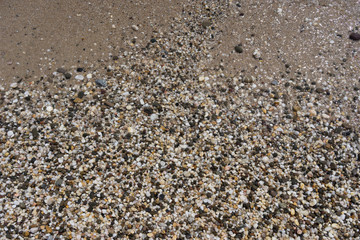 Natural background of small colored pebbles