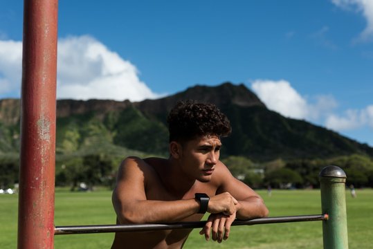Man taking a break while exercising in the park