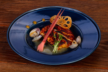Roasted cod fish with scallops