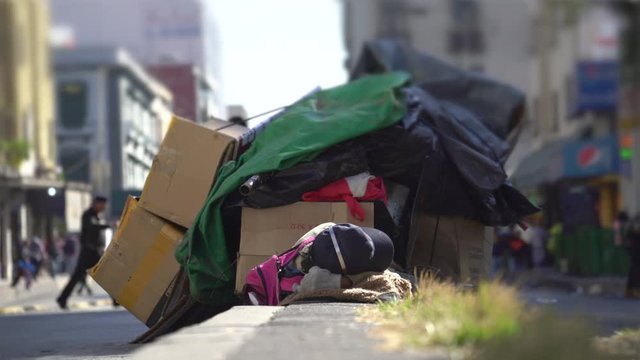 Homeless people lying on the street - Mexico City, Mexico