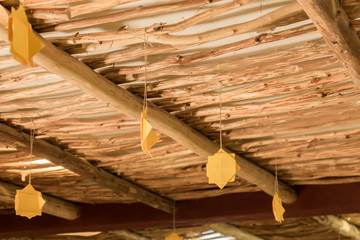 origami decoration hanging udner the ceiling in oriental room