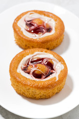 sweet cakes with cream and jam, top view