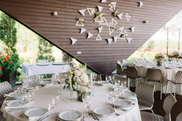 Festive lunch at restaurant. A wedding table for guests.