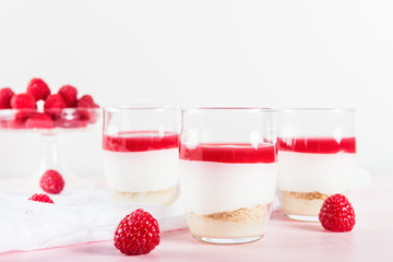 Raspberry dessert from whipped white chocolate mousse and raspbe