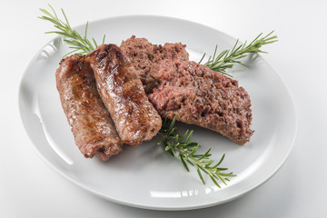 Dish with grilled sausages
