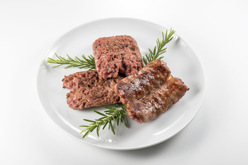 Dish with grilled sausages