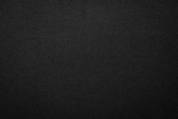 Zelfklevend Fotobehang Zwarte stof textuur achtergrond. Donker kleding materiaal. © Lemonsoup14