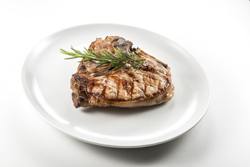 Grilled t-bone chop of pork