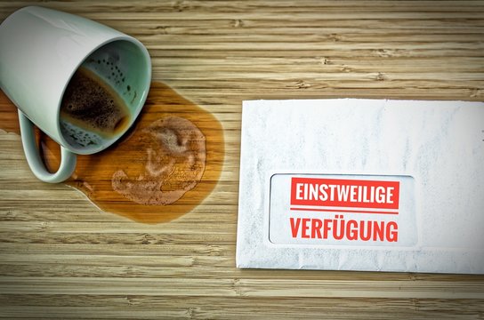 Brief mit Einstweilige Verf&uuml;gung in englisch Interim disposal