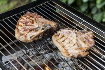 T-bone chop of pork on the grill