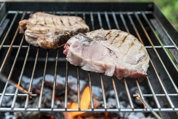T-bone chop of pork on the grill