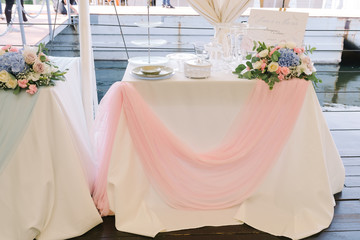 Decoration of a wedding celebration in fresh flowers
