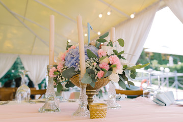 Decorating of a table at a modern wedding