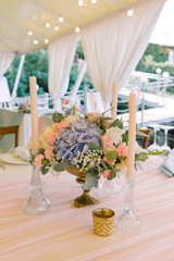 Decorating of a table at a modern classic bridal