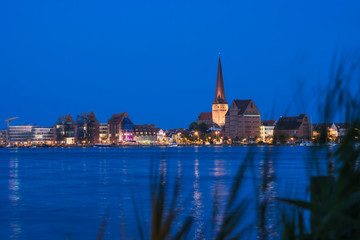 Rostock. Night Panorama view to Rostock in Germany. River Warnow and City port.