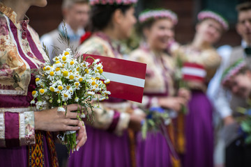 Song and dance festival in Latvia. Procession in Riga. Elements of ornaments and flowers. Latvia 100 years. - obrazy, fototapety, plakaty