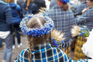 Song and dance festival in Latvia. Procession in Riga. Elements of ornaments and flowers. Latvia 100 years.