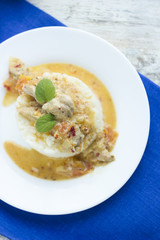Meat in a sauce with rice