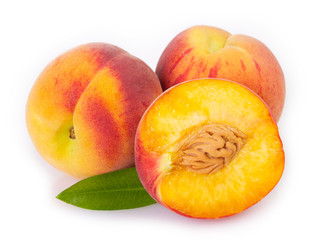 Fresh peaches on white background
