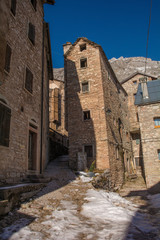 A street in the hill village of Casso in winter Friuli Venezia Giulia, north east Italy. 