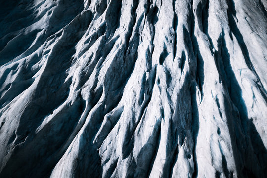 Aerial view of glacier crevasses