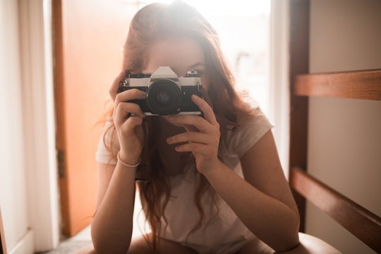 Woman clicking photo with camera