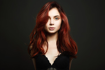 Naklejka premium beautiful girl with healthy red color hair