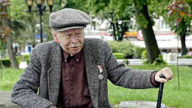 Senior man in green park
