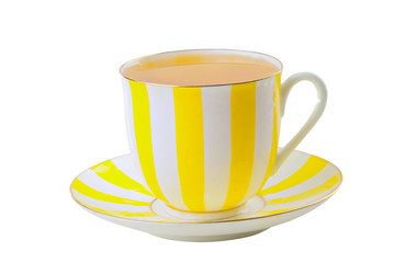 porcelainl cup with green tea on table