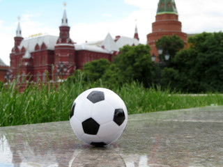 Soccer ball on background of Moscow Kremlin towers and Red square. Concept for football in Russia