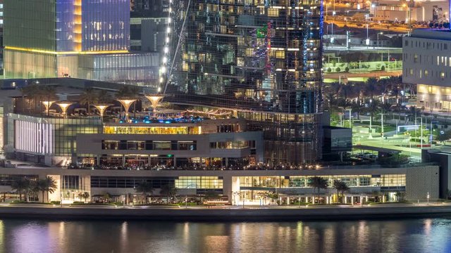 Aerial skyline of Abu Dhabi city centre from above night timelapse