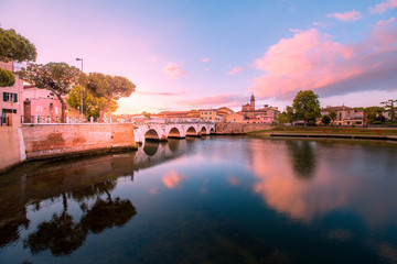 Fototapeta premium Colorful Rimini cityscape at the sunset. Historic old Rimini centre.