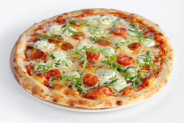 Pizza with tomatoes and arugula and mozzarella