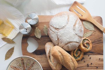 Different kind of bread on the kitchen table