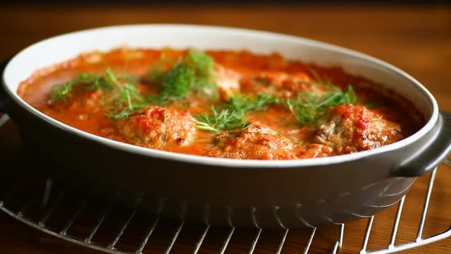 meatballs with tomato sauce on the table