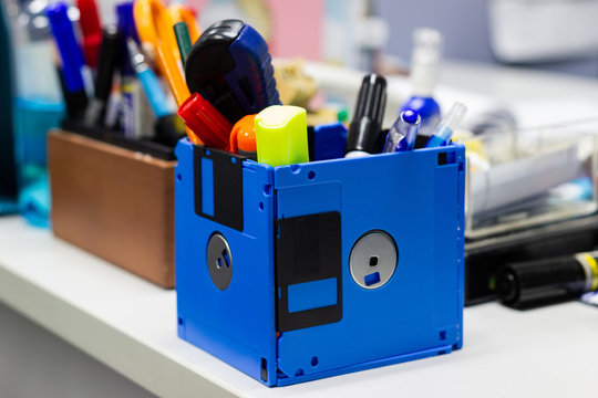 recycle floppy disk, Creative objects used for Store supplies such as pen pencils Scissors in a box on the table in work office, concept recycle floppy disk 