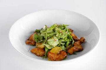  salad with chicken steak, salad mix, orange, cheese. Under the olive oil.