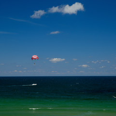  Nessebar beach Bulgaria 25.06.2018 Active recreation - motor boat tows a special parachute. A popular sea attraction parasailing