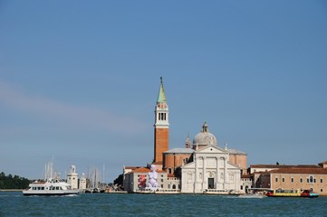 Fototapeta na wymiar Cityscape with sea and ships in Venice, Italy