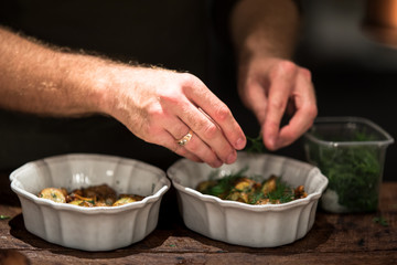 Chef cooking in restaurant close up