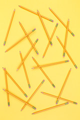 Pencils on a yellow background. Back to school concept