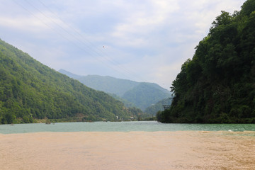 View of confluence of two mountain rivers Adjaristskali and Chorokh in Adjara, Georgia