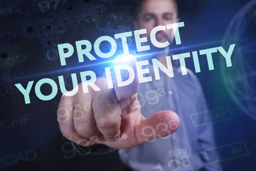 The concept of business, technology, the Internet and the network. A young entrepreneur working on a virtual screen of the future and sees the inscription: Protect your identity