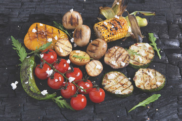 Fototapeta na wymiar vegetable grilled tomatoes pepper paprika corn potatoes mushrooms