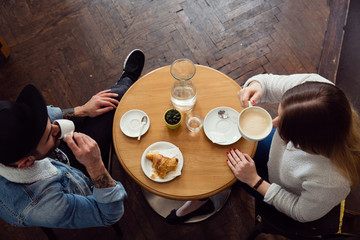 Couple having coffee in cafe