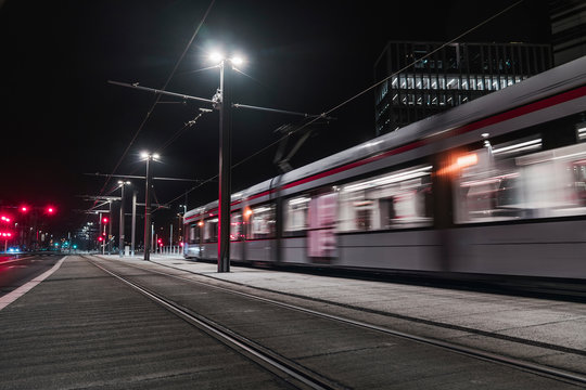 Electric railway train passing office buildings, Aarhus, Midtjylland, Denmark