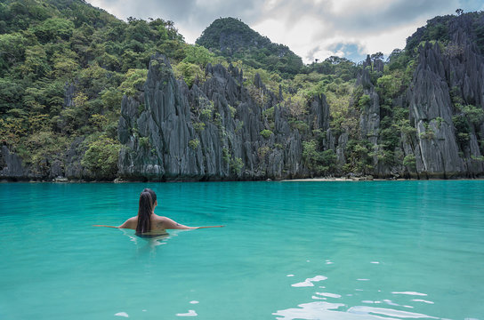 Woman in sea, Banga, Palawan, Philippines