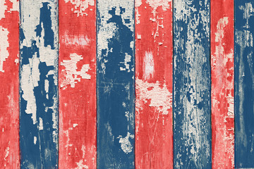 Background texture for design. Old colored boards. Alternate blue and red. Bare old paint