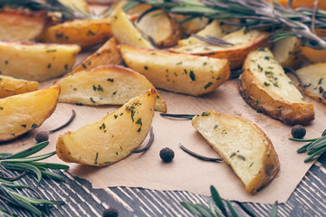 background with baked potatoes with rosemary