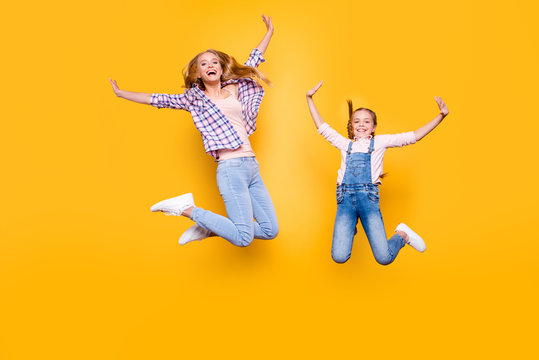 Different teen age game victory win childish emotion expression concept. Full length size body portrait of cheerful laughing delightful comic girl in casual denim outfit isolated on bright background